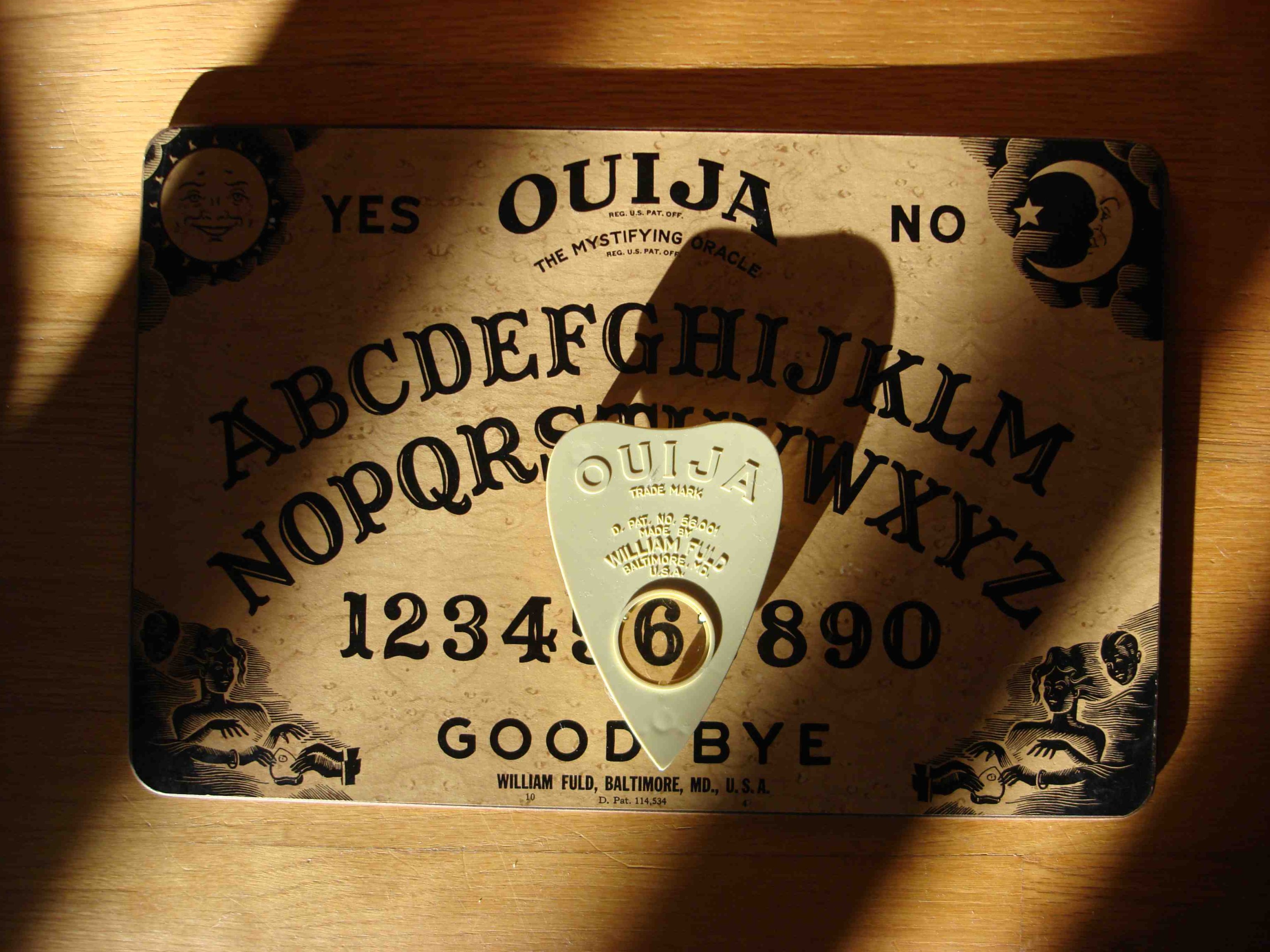 Ouija Board In Shadows