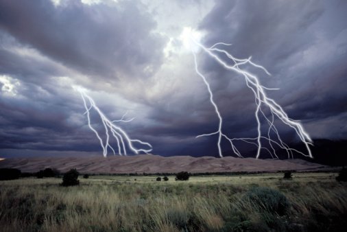 Landscape with lightning bolts from storm